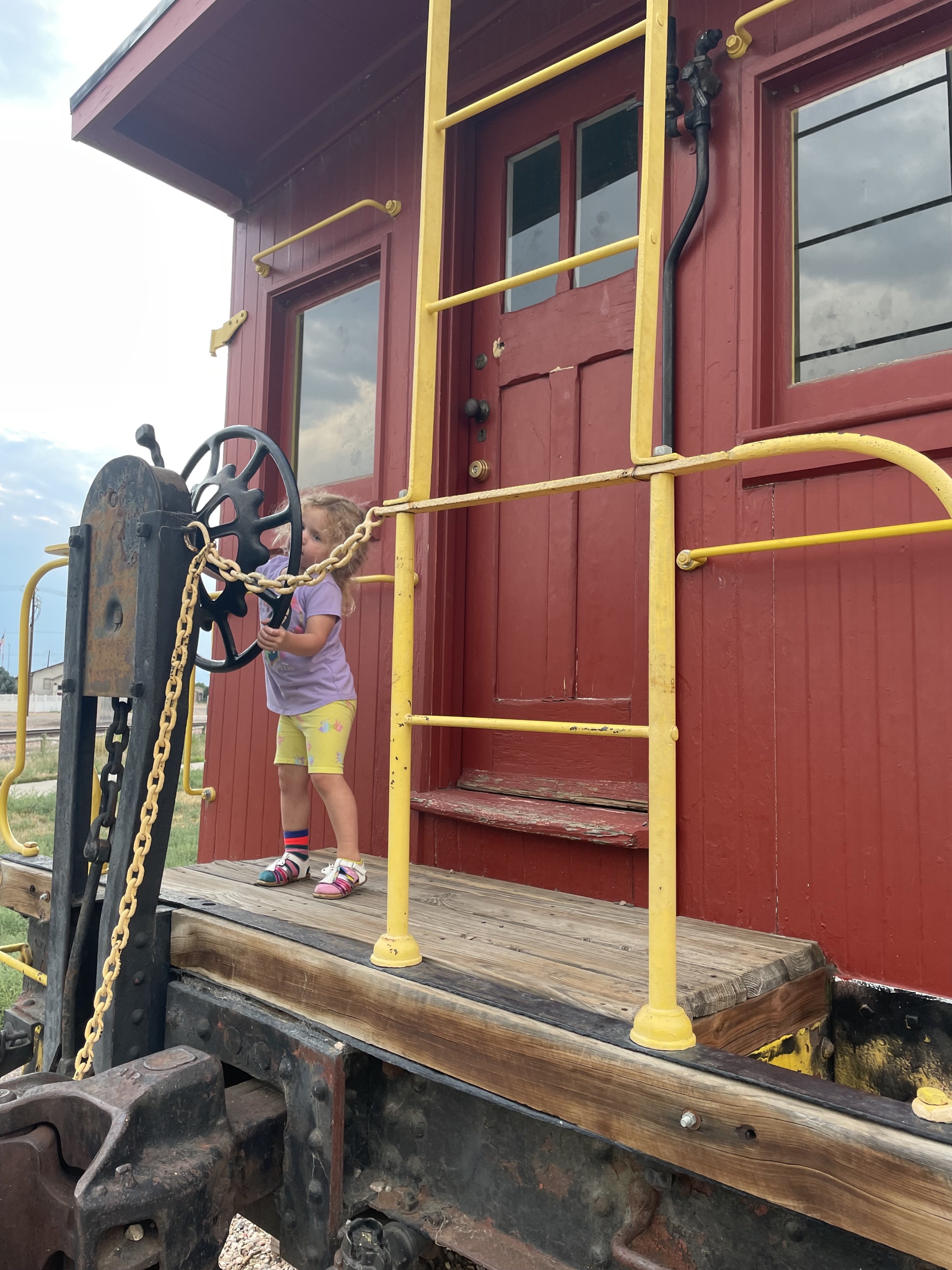 The author&#x27;s daughter exploring a train