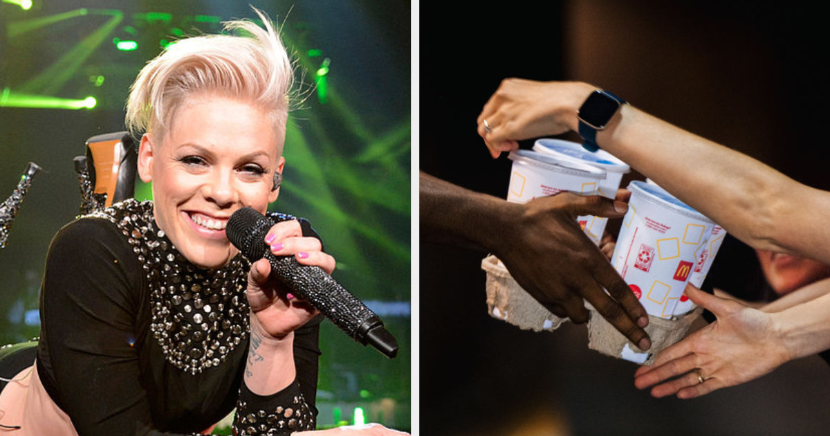 Pink on stage side by side with a McDonald's employee handing a drink tray to a drive-thru customer