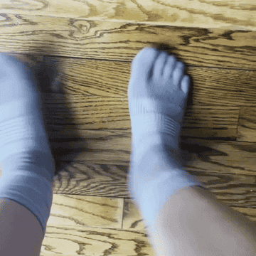 gif of the writer dancing in the midweight toe socks