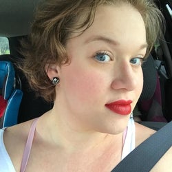 reviewer wearing a red shade