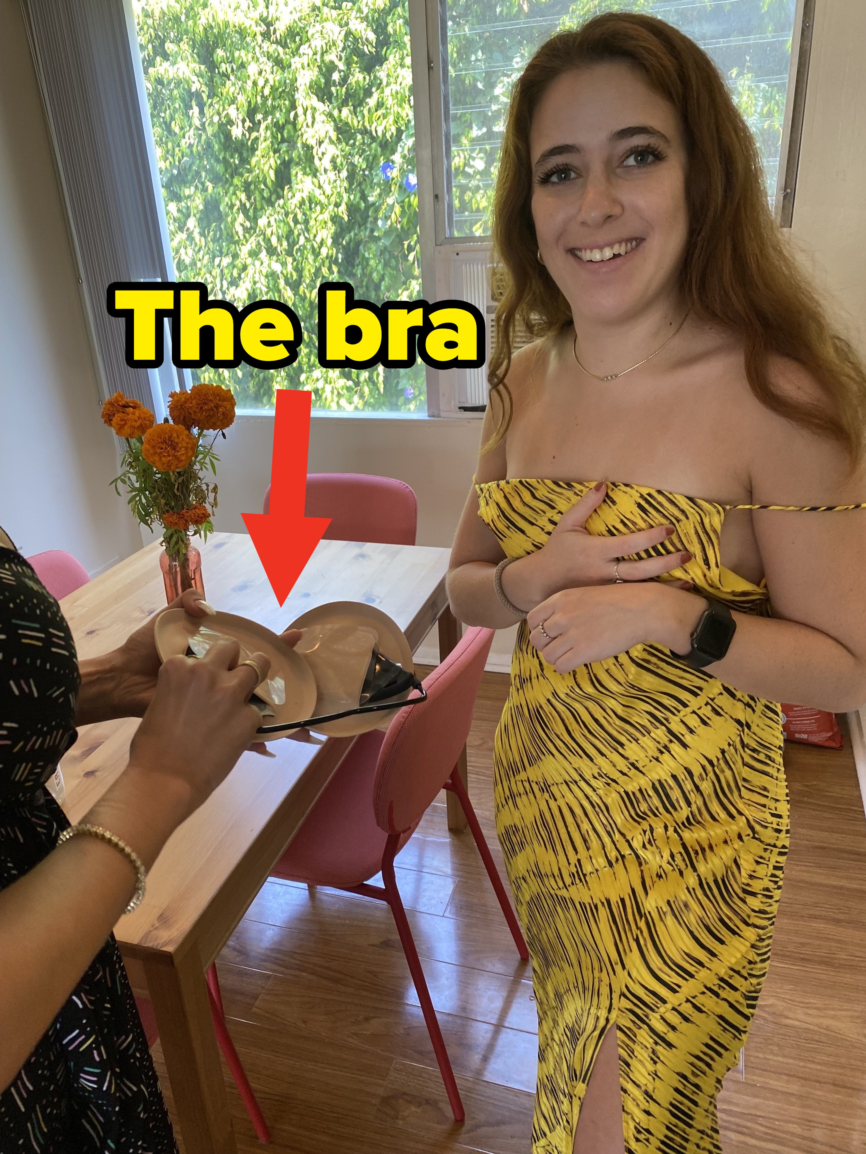 Amanda showing Daniella the bra