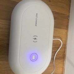 reviewer photo of UV phone sanitizer closed and plugged in