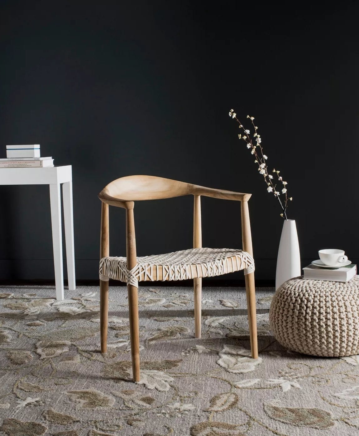 The white and teak armchair
