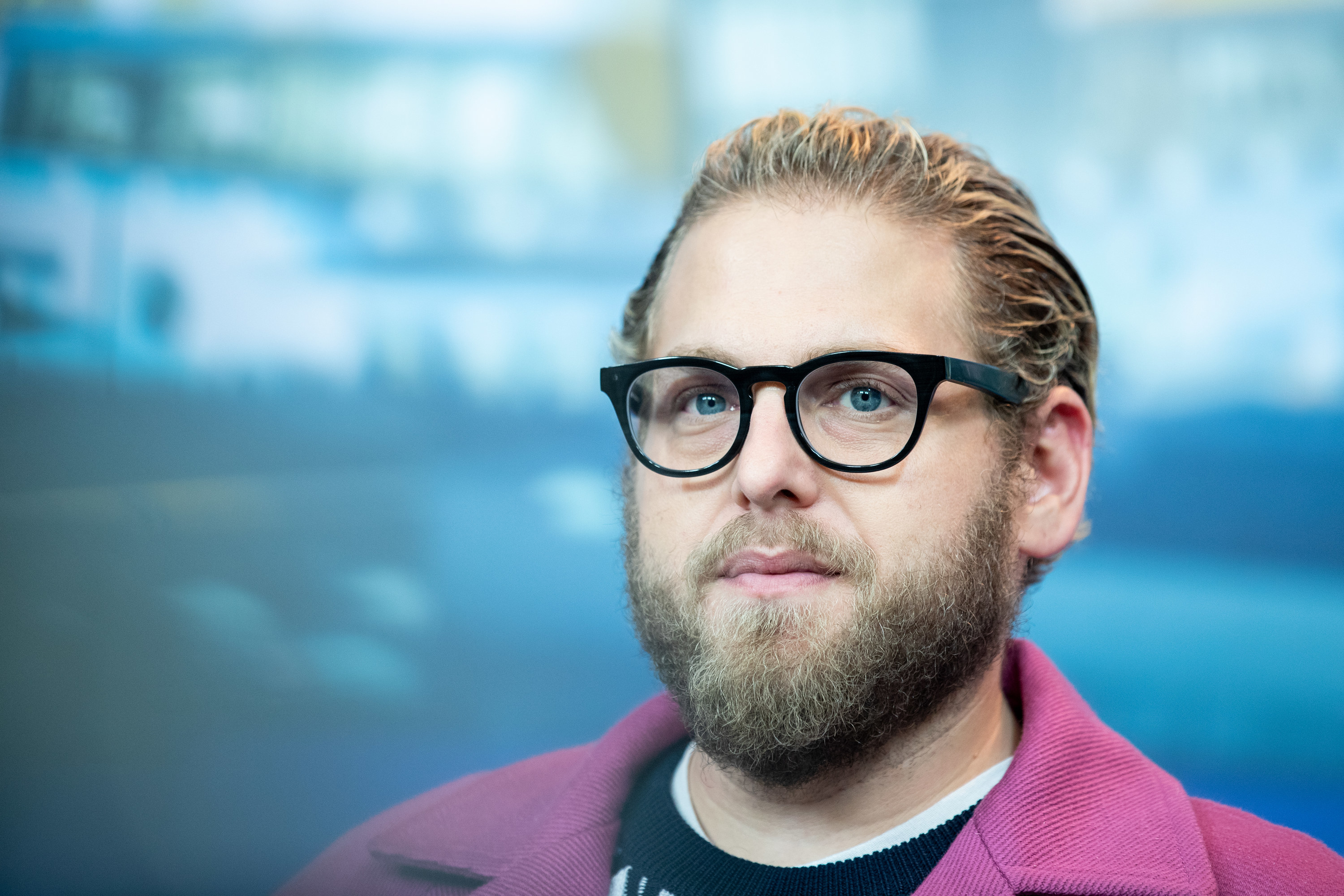A head shot of Jonah with glasses and a beard