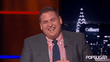 GIF of Jonah laughing on a talk show