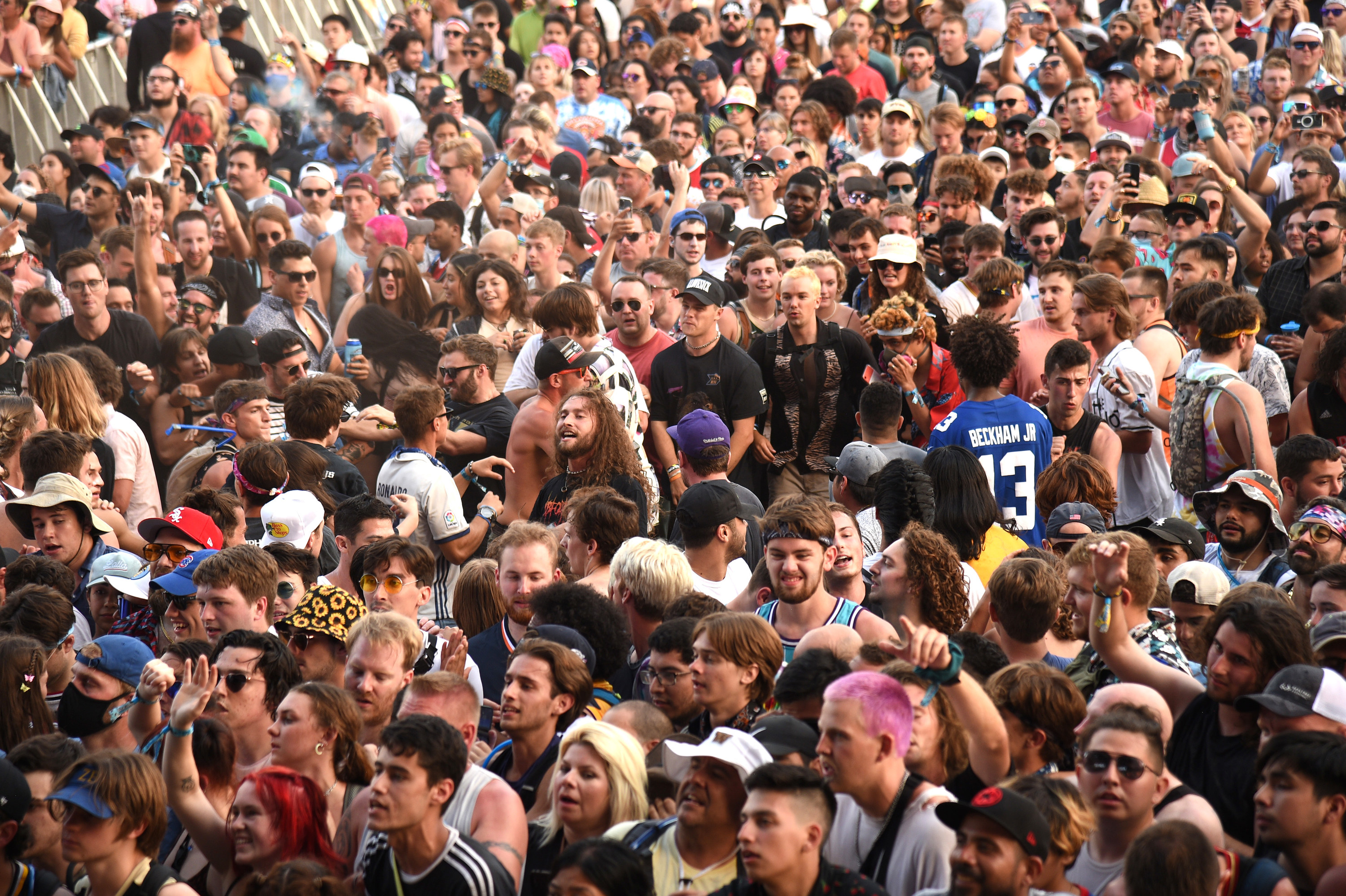 A candid view of a crowd of people at Lollapalooza music festival in Chicago.