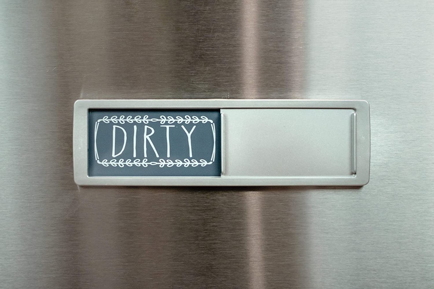 The slidable magnet on a dishwasher set to dirty
