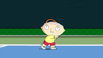 Stewie Griffin aggressively hits a tennis ball with a racket
