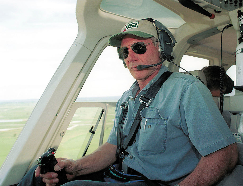 Harrison Ford piloting a helicopter