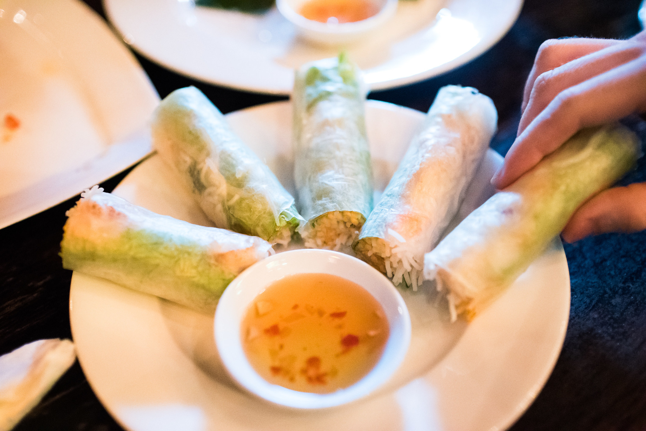 Vietnamese spring rolls with Nuoc cham for dipping.
