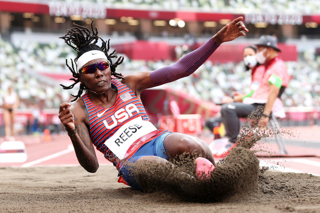 Brittney Reese landing in the sand as she competes in the Women's Long Jump Qualification
