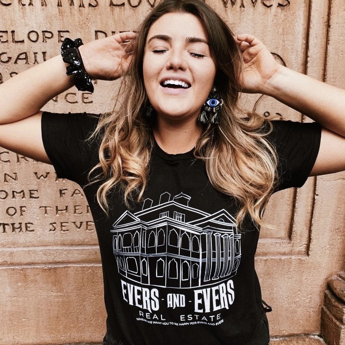 Model wearing &quot;Evers and Evers&quot; tee