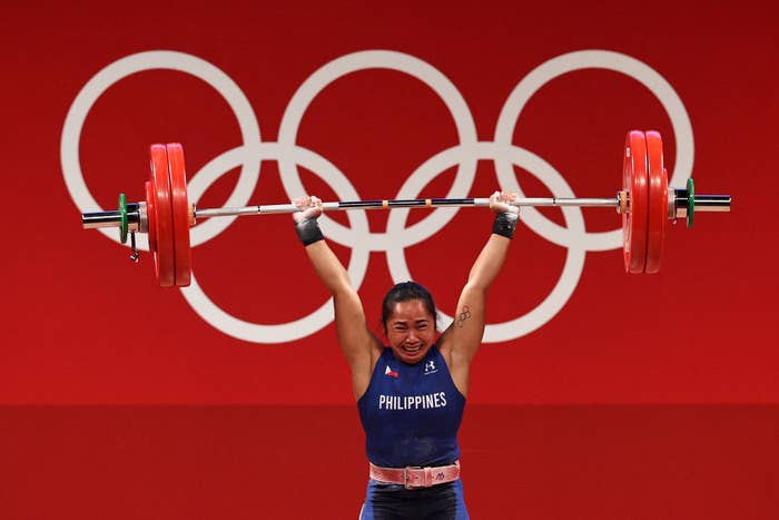 Hidilyn Diaz of Team Philippines competes during the Weightlifting - Women&#x27;s 55kg Group