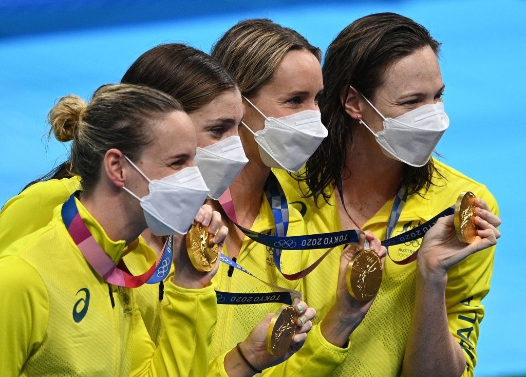 Gold medallists (from L-R) Australia&#x27;s Bronte Campbell, Australia&#x27;s Meg Harris, Australia&#x27;s Emma Mckeon and Australia&#x27;s Cate Campbell pose after the final of the women&#x27;s 4x100m freestyle relay swimming event