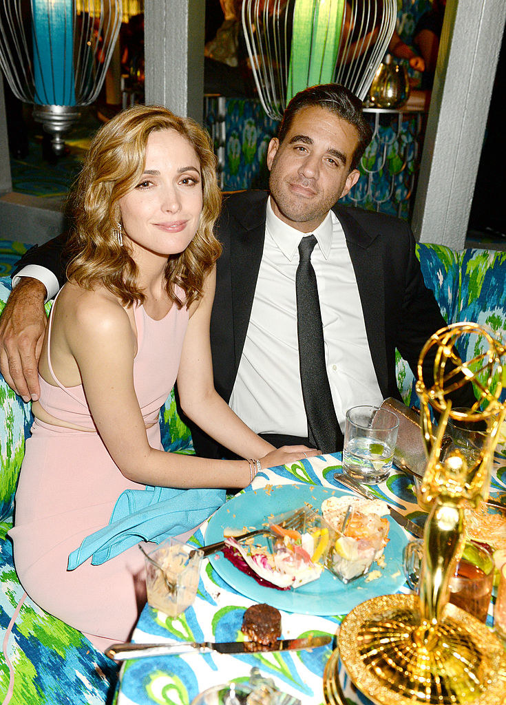 Rose Byrne (L) and Bobby Cannavale sitting at a dinner table at HBO&#x27;s official Emmy after party