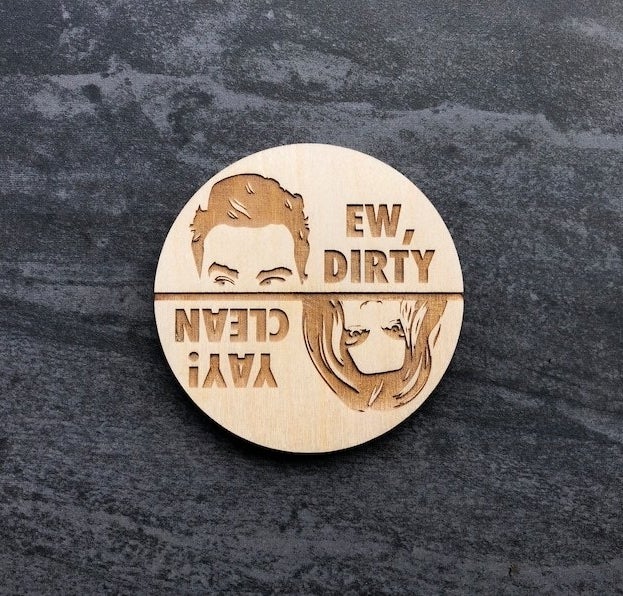 round wood magnet with david&#x27;s face and the text &quot;ew, dirty&quot; on one half and alexis&#x27;s face and &quot;yay! clean&quot; on the other