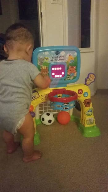 Reviewer's child playing with the sports center