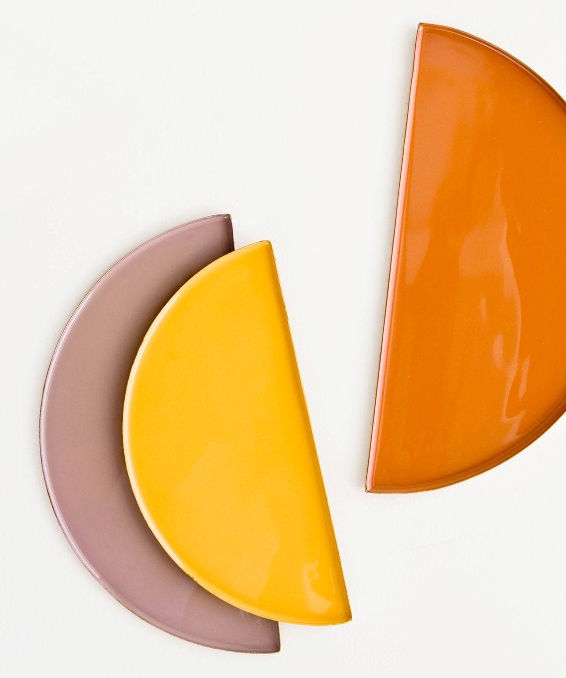 the crescent dishes in three different colors