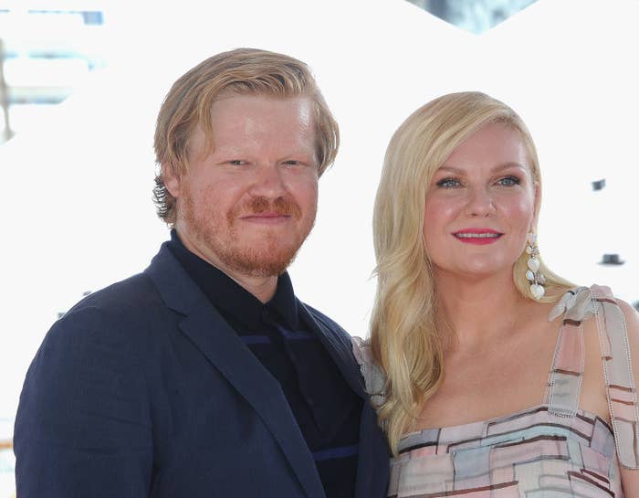 Jesse and Kirsten smiling as they pose for a photo