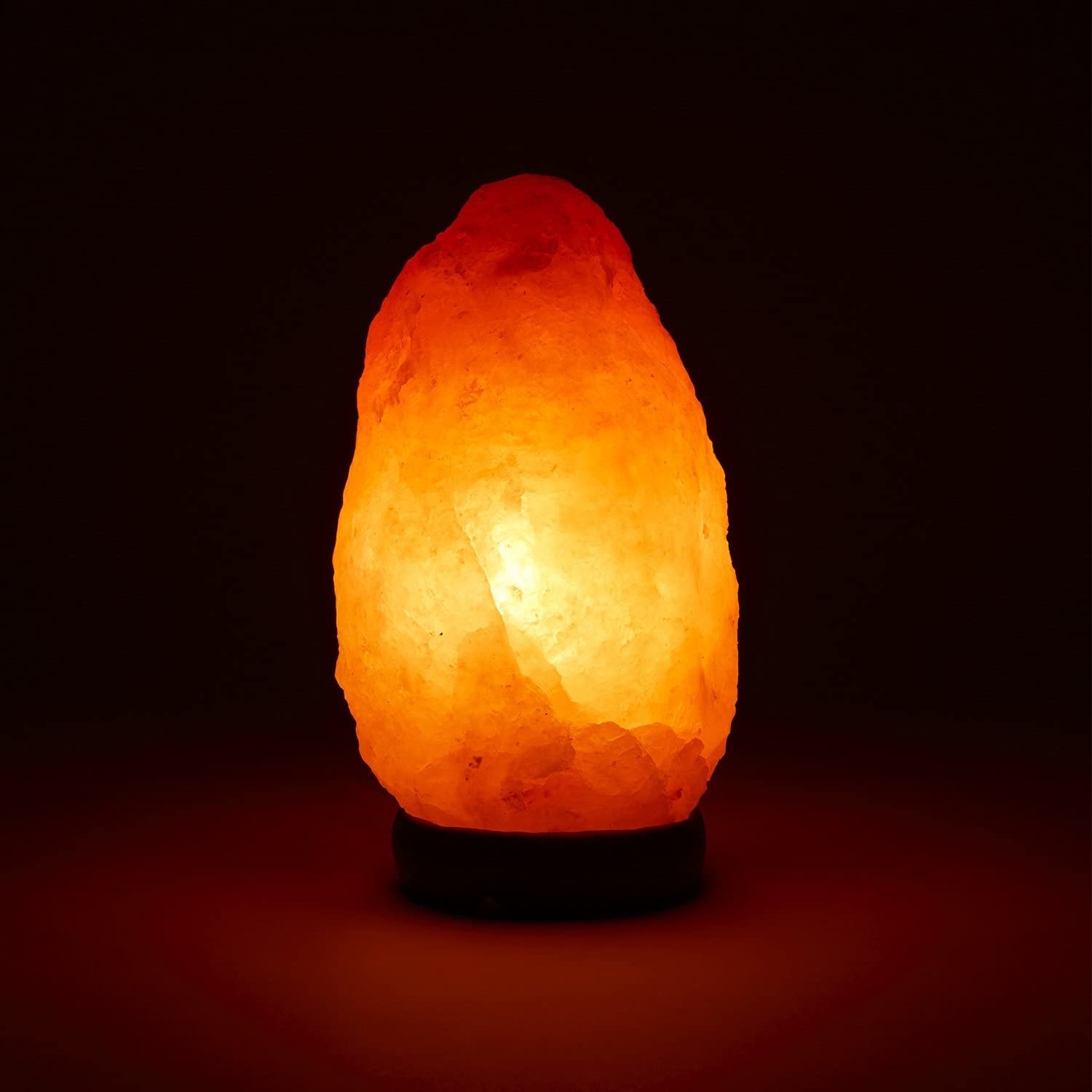 the salt lamp emitting a warm glow
