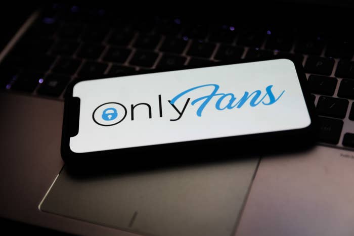 OnlyFans logo is seen displayed on a phone screen