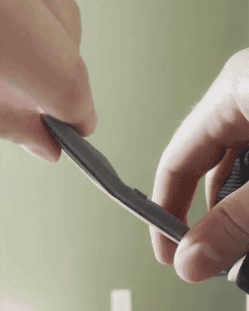 gif of the writer flexing the super thin battery pack