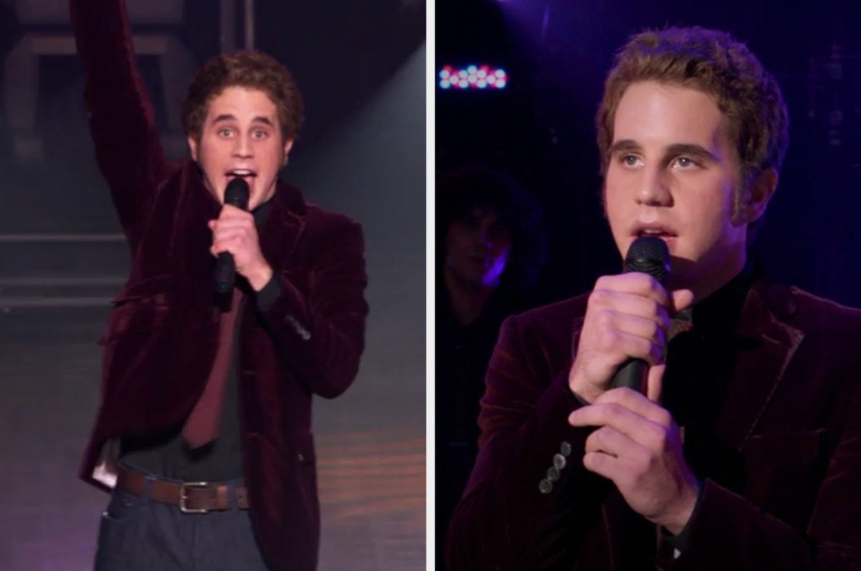Benji wearing a velvet blazer during a performance on stage