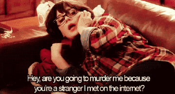 A scene of Jess from the series New Girl speaking on the phone and asking &quot;Hey, are you going to murder me because you&#x27;re a stranger I met on the internet&quot;
