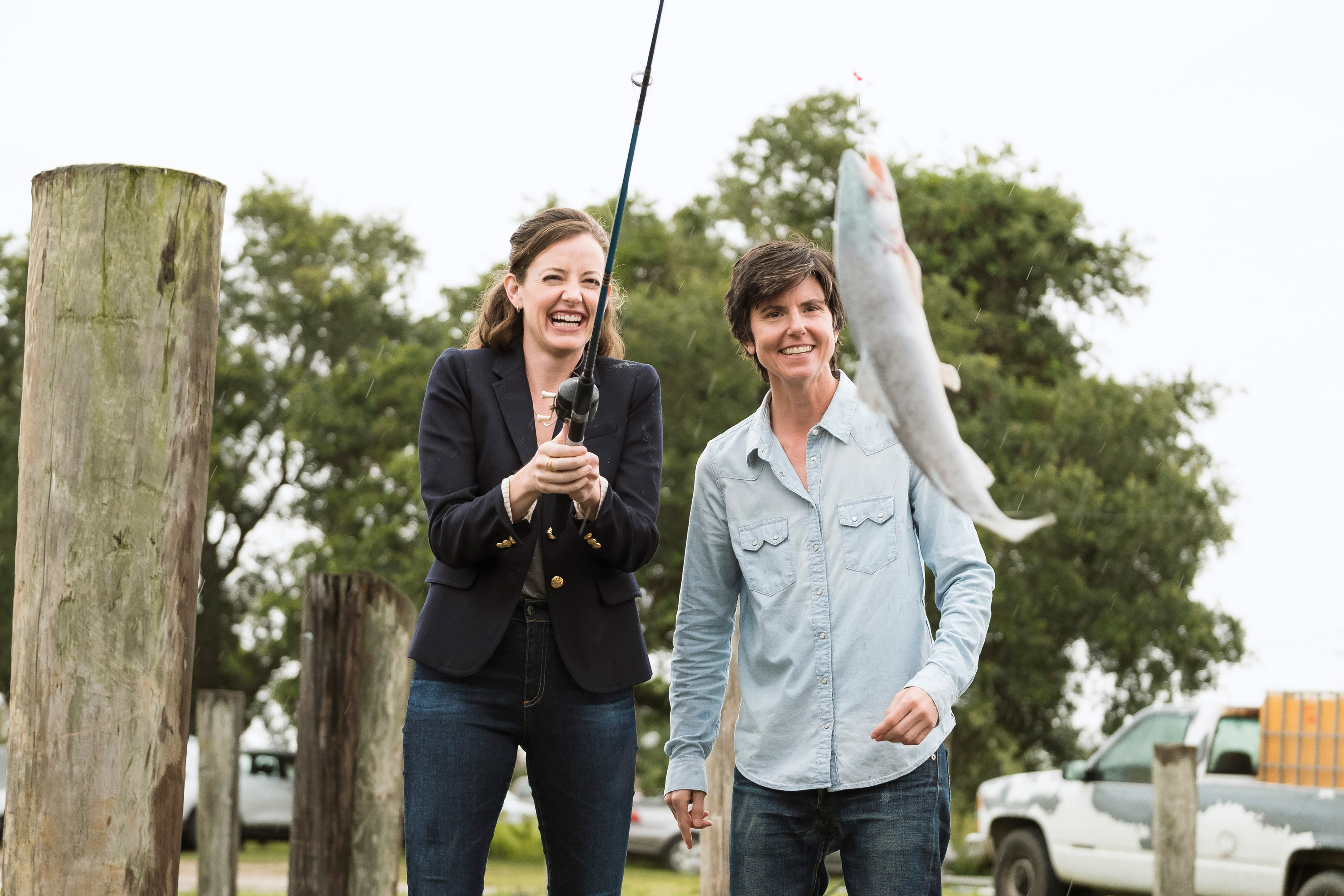 Stephanie Allynne and Tig Notaro catch a fish