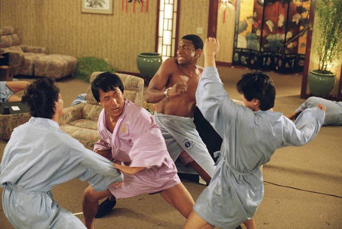 Jackie Chan and Chris Tucker fighting two people in bathrobes