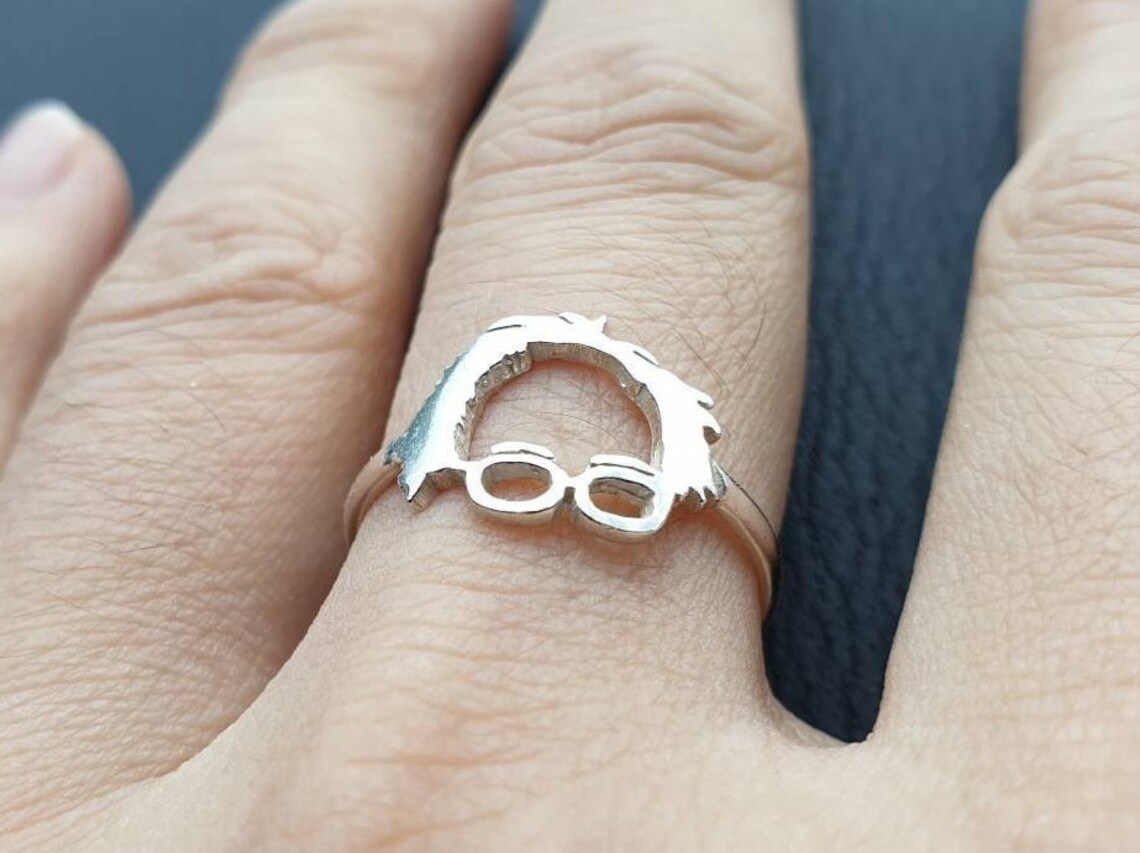 ring shaped like bernies hair and glasses