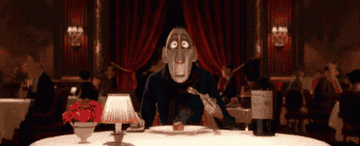 A shot of the critic as an old man taking a bite of ratatouille before zooming out, transitioning into a shot of him as a young child.