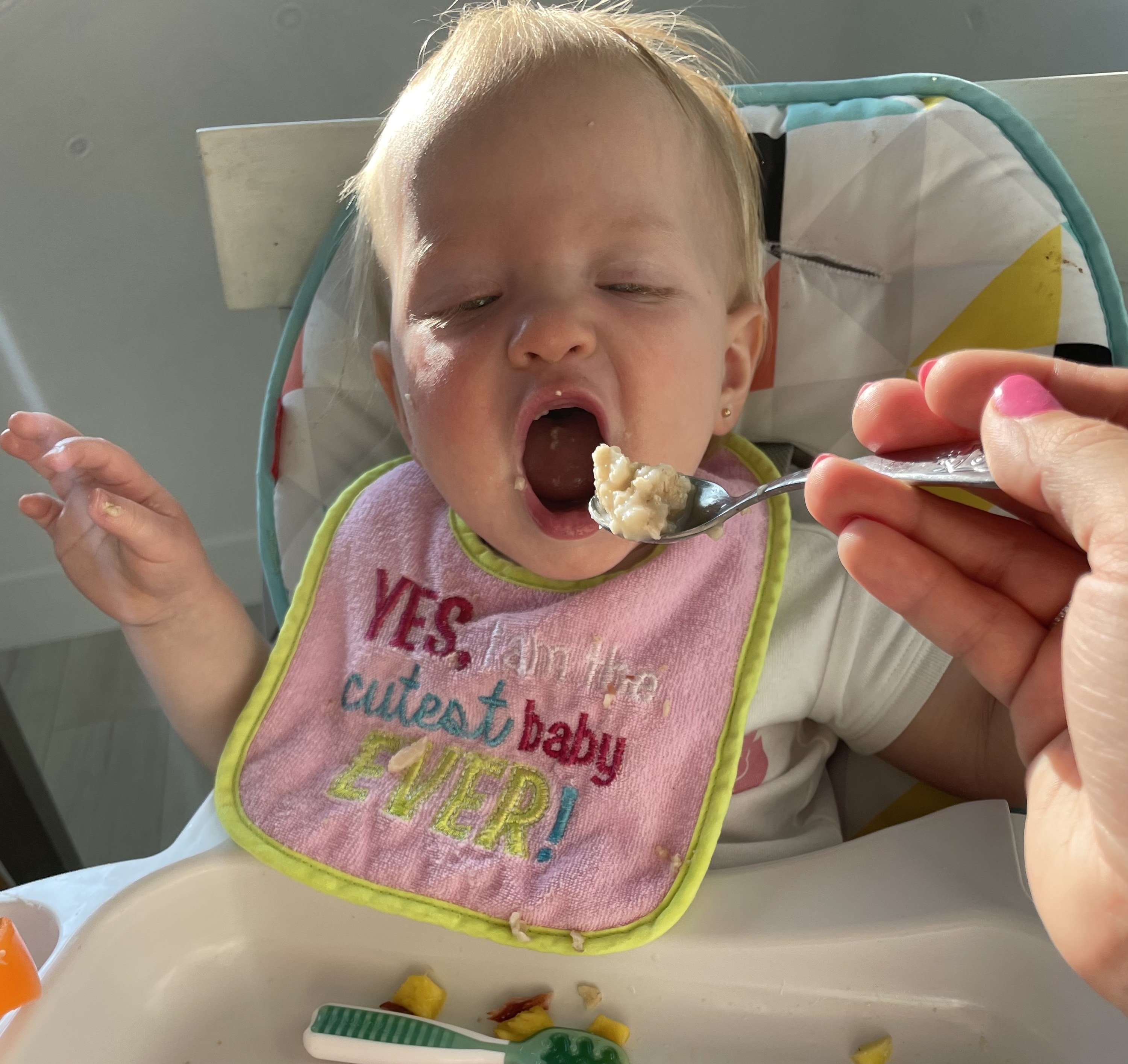 The author&#x27;s baby eating oatmeal