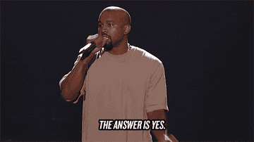 Kanye West with a microphone saying, &quot;The answer is yes.&quot;