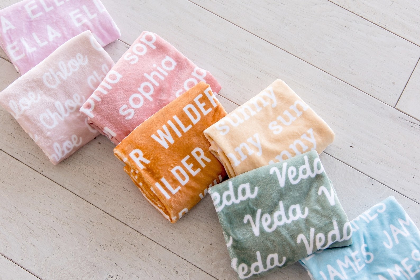 The personalized name blankets in seven different colors