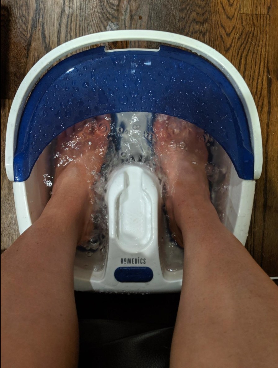the at-home pedicure machine being used by a reviewer