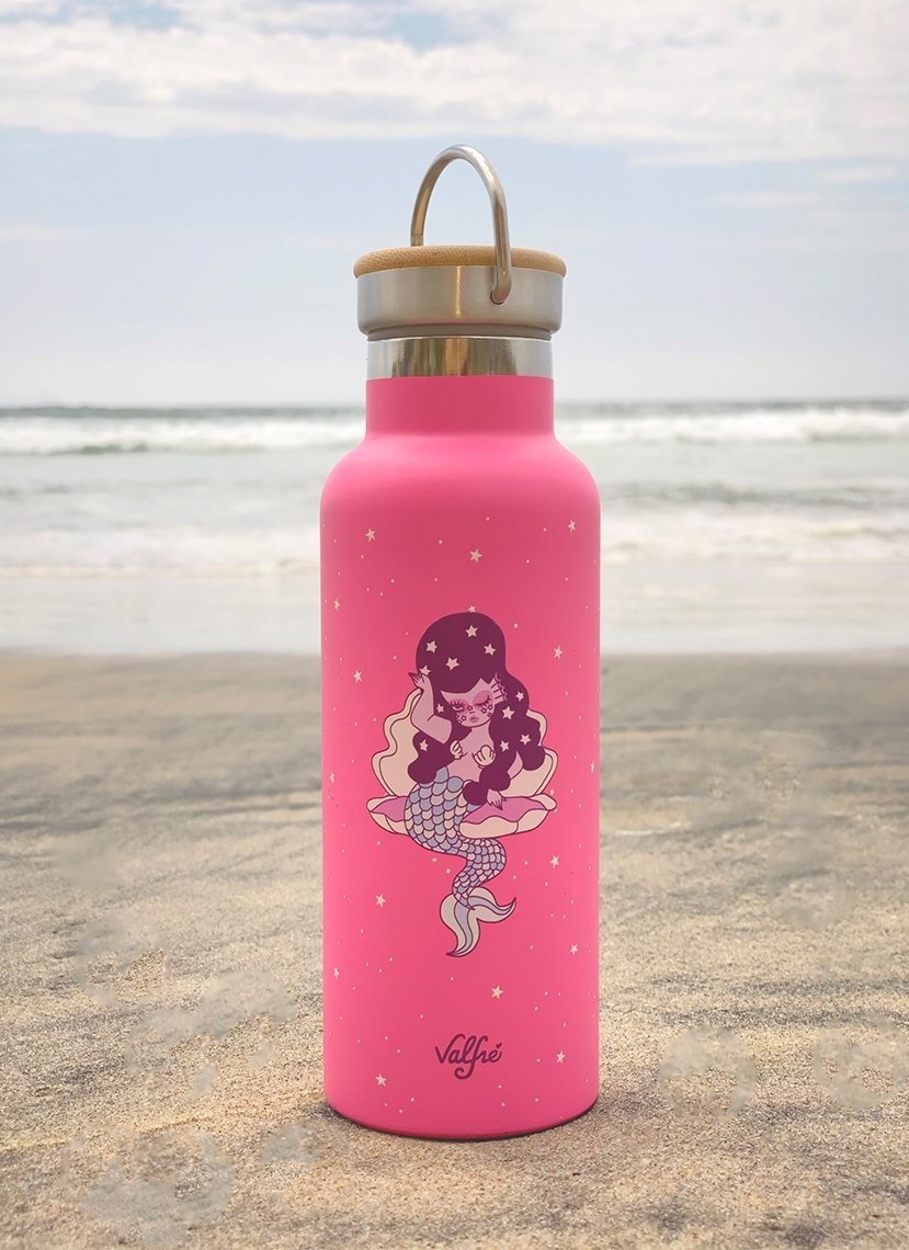 pink water bottle with top removable lid and mermaid design on it