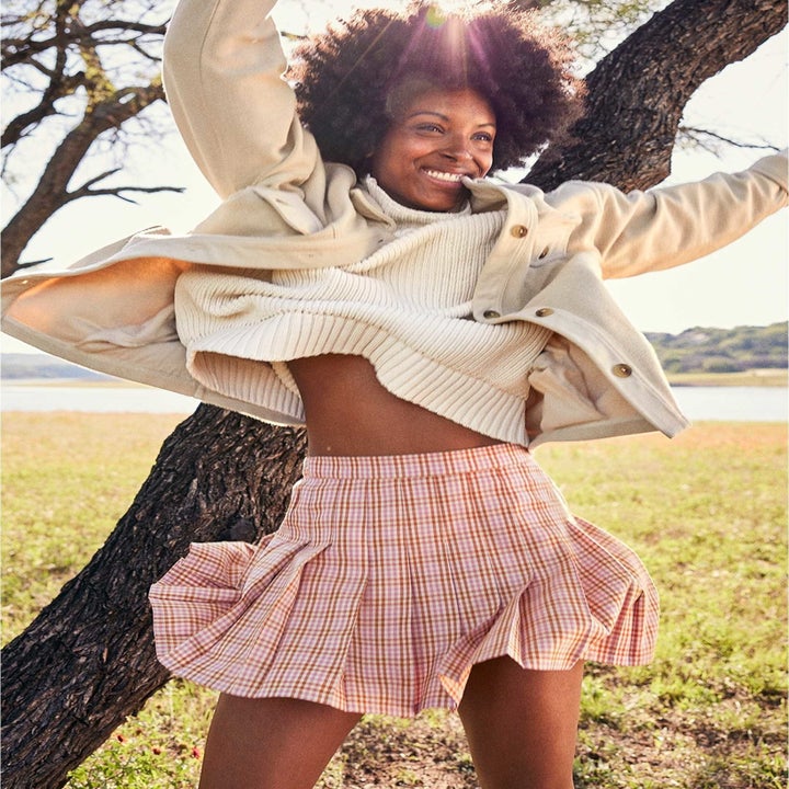 model in a plaid mini skirt
