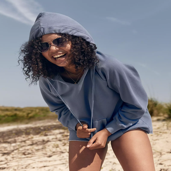 model in a blue hoodie