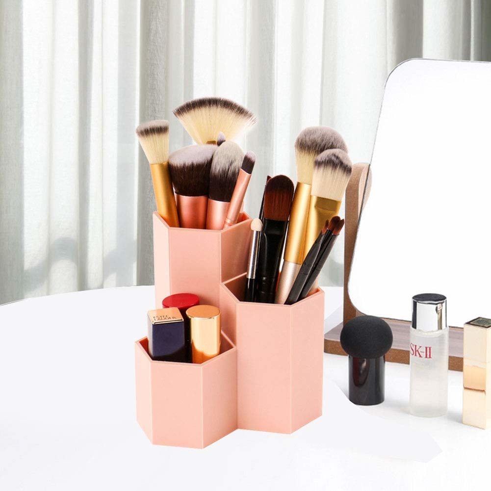geometric makeup brush holder with three attached tiers