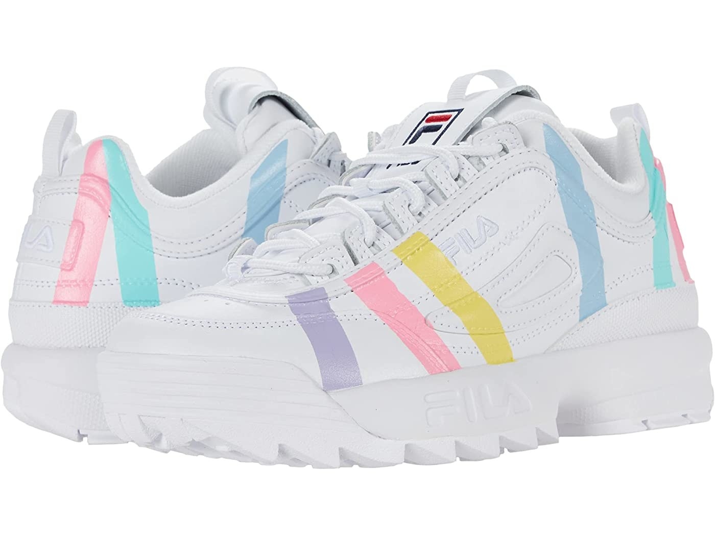 chunky white fila sneakers with pastel stripes on them