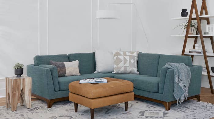 a teal sectional sofa