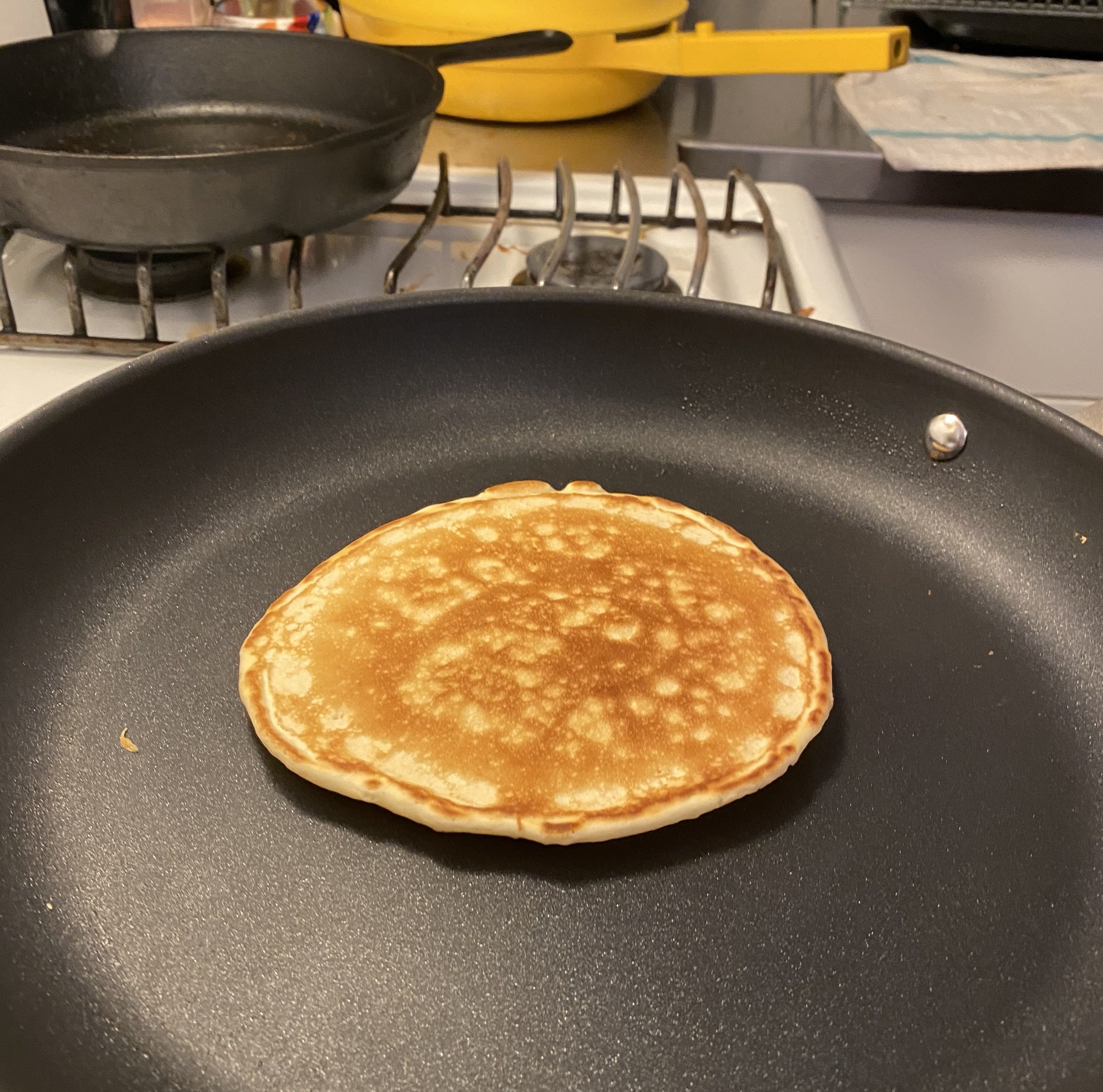 the writer's golden brown pancake in the pan