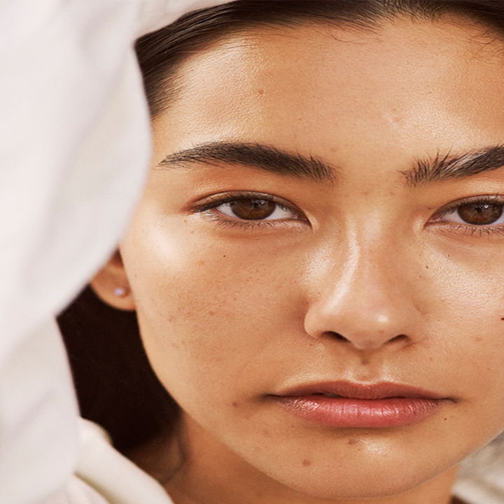 a model wearing the serum