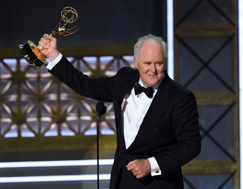 John Lithgow shows off his Emmy at the Emmys