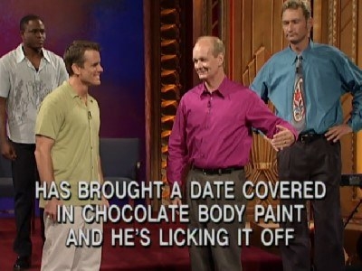 Wayne, Chip, and Ryan all stand around Colin, with onscreen text reading, &quot;He has brought a date covered in chocolate body paint and he&#x27;s licking it off&quot;