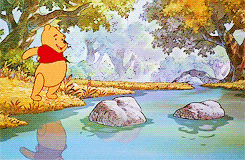 a gif of winnie the pooh skipping across rocks