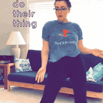 Woman dancing in her living room