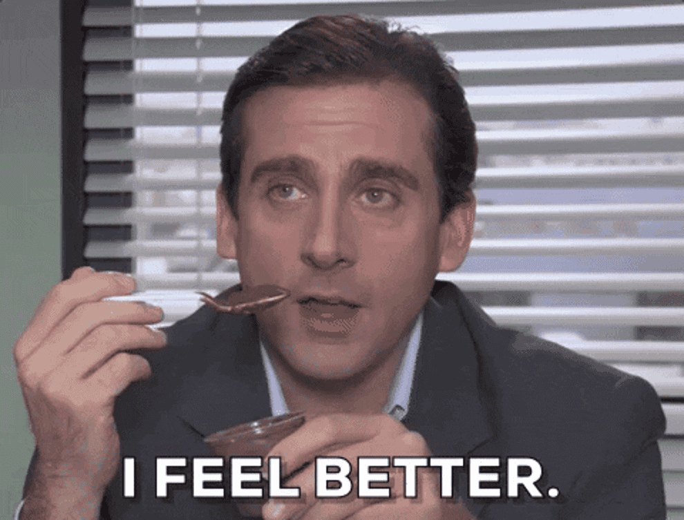 michael scott from the office eating pudding in a gif while saying i feel better