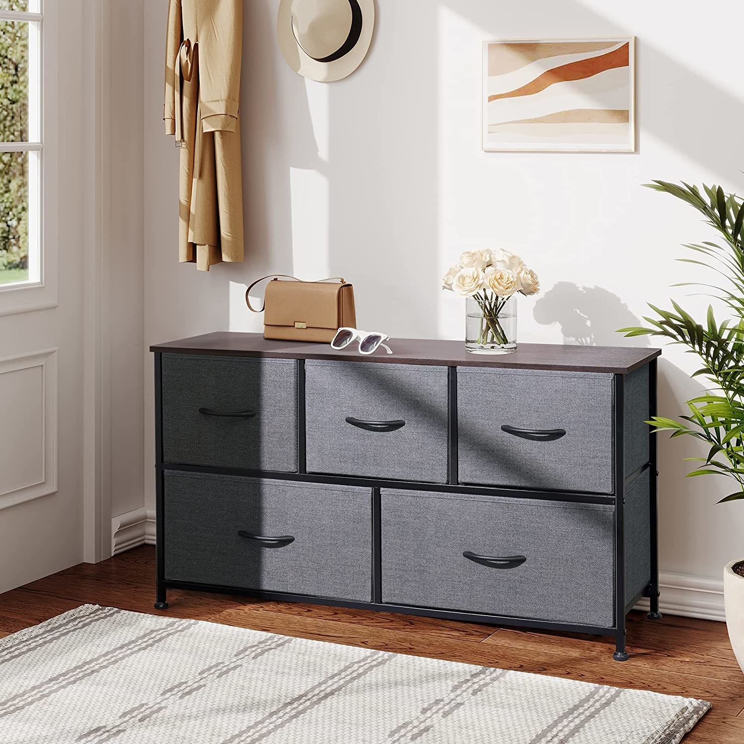 the dresser in charcoal gray with five storage drawers
